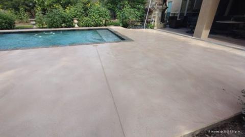 Trowel down overlay 6900PSI Simulated Slate like texture stained semitransparent with a solvent based acrylic sealer, Anti-slip.