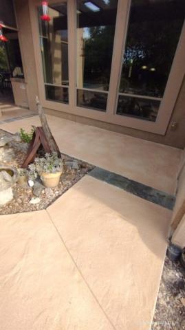 Trowel down overlay 6900PSI Simulated Slate like texture stained semitransparent with a solvent based acrylic sealer, Anti-slip.