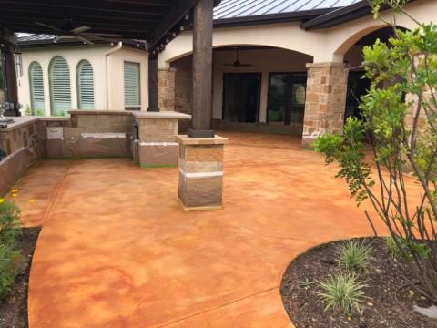 Trowel down overlay 6900PSI Simulated Slate like texture stained semitransparent with a solvent based acrylic sealer, Anti-slip.