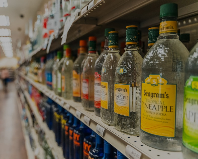 display of flavored vodka on store shelf