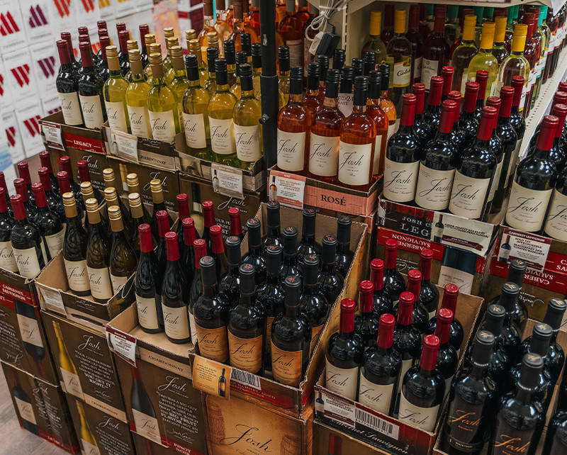 store display of bottles of red wine