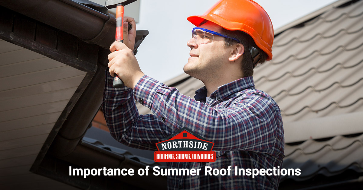 Man conducting roof inspection