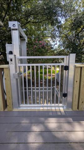 Open wheelchair lift from porch