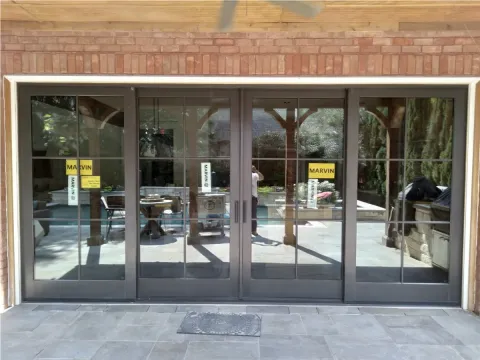 large sliding glass doors with black frames