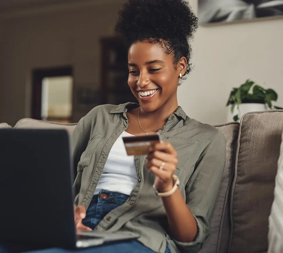 a woman holding credit card