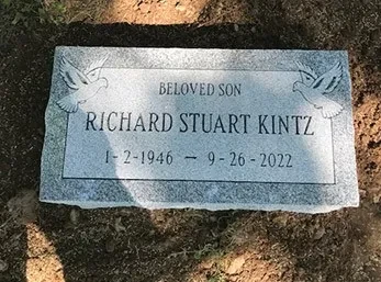 grave markergrey with doves