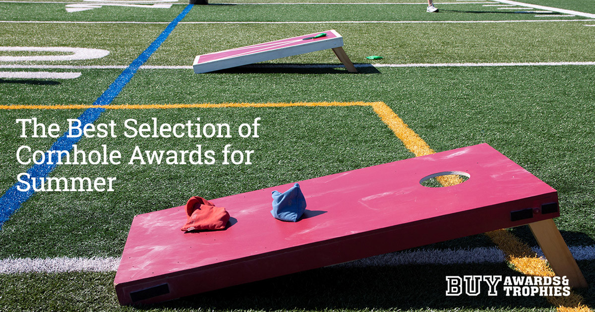 Cornhole tournament at football field in the summer