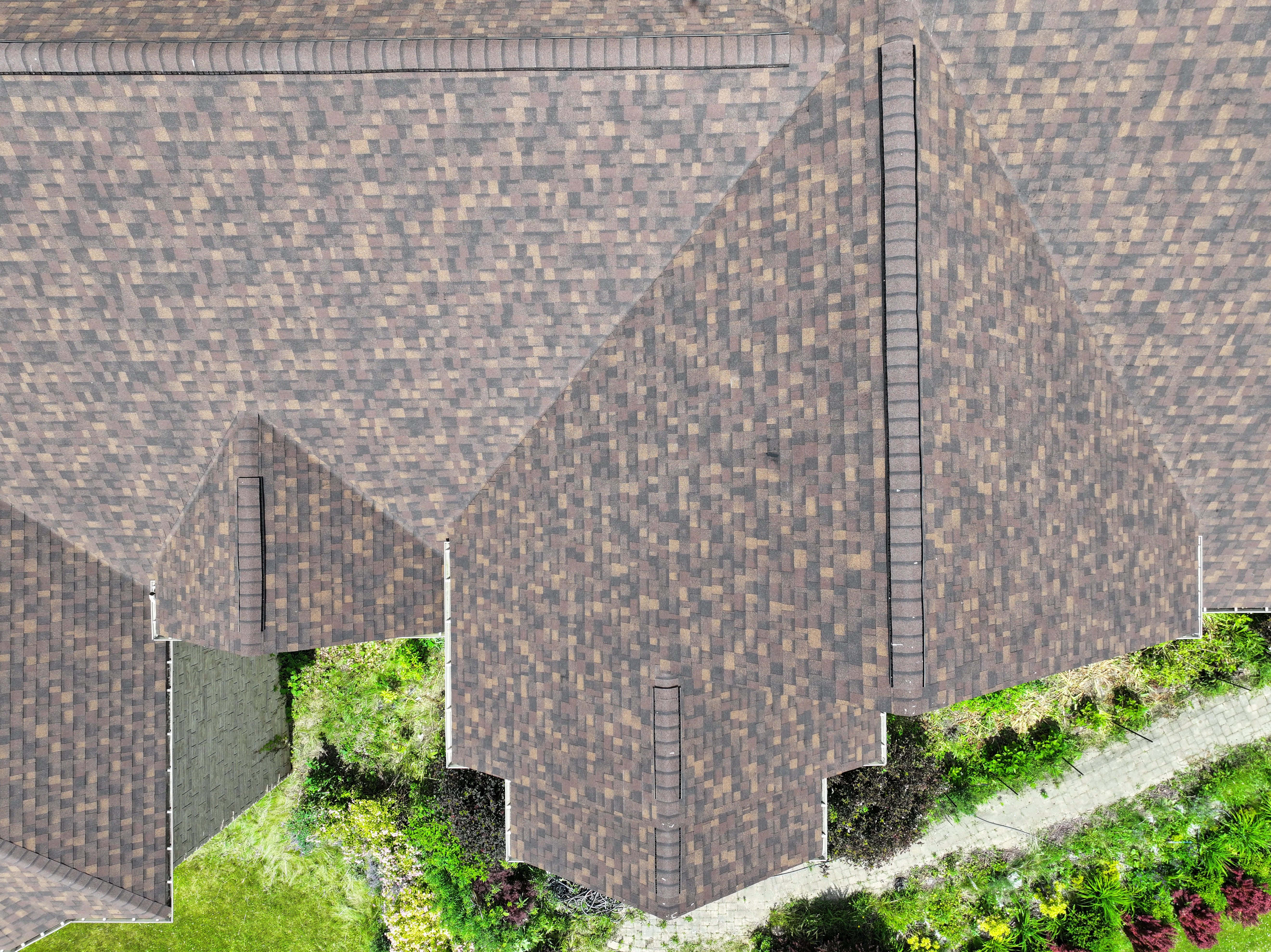 An aerial view of a new roof on a house.