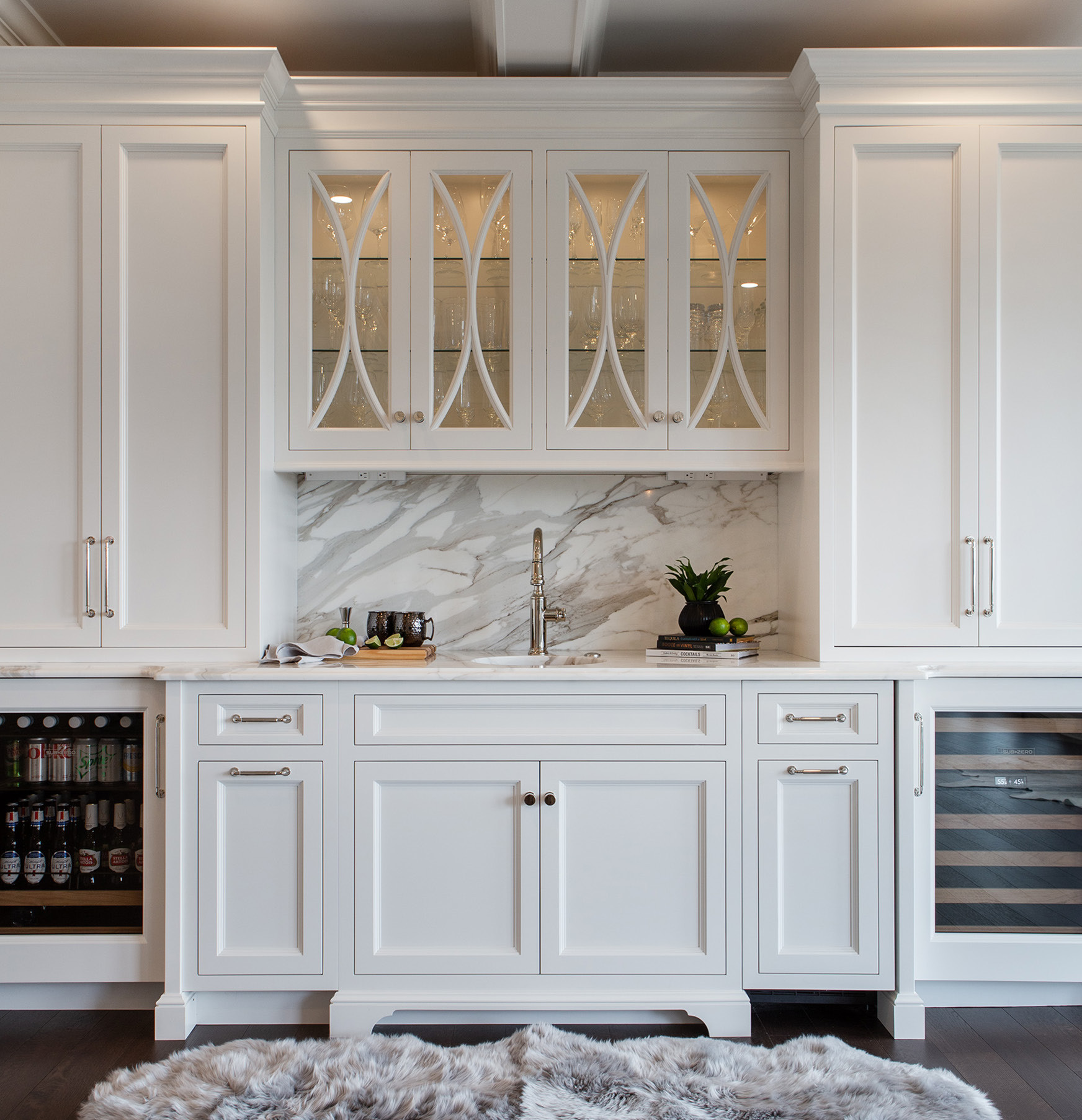 Model of white bathroom kitchen cabinets in a showroom.