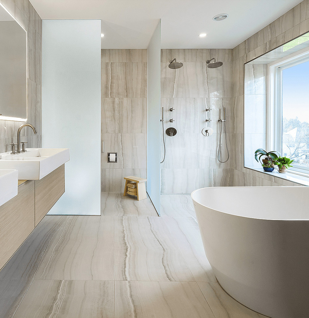 Model of a white bathroom in a showroom.