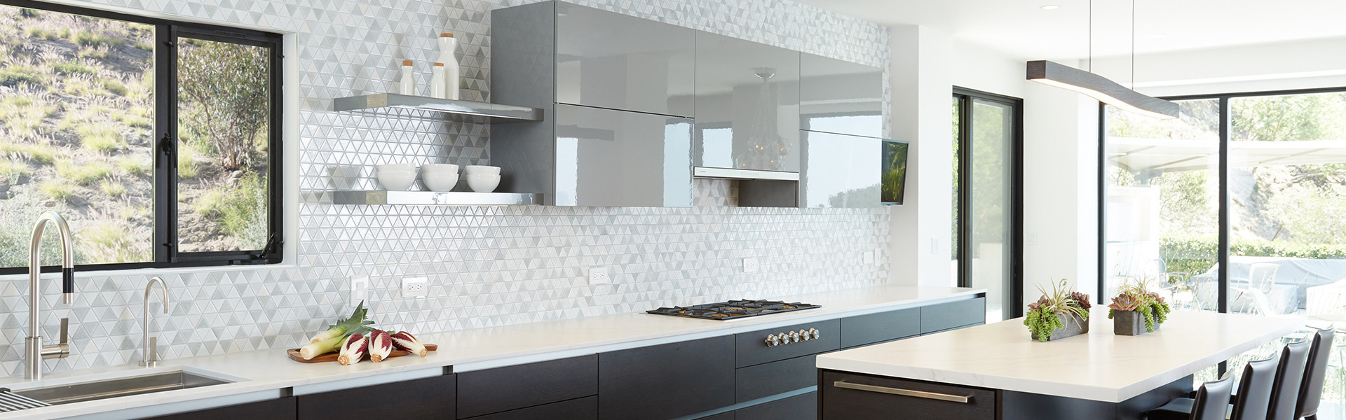 modern kitchen gray cabinets triangle tile wall