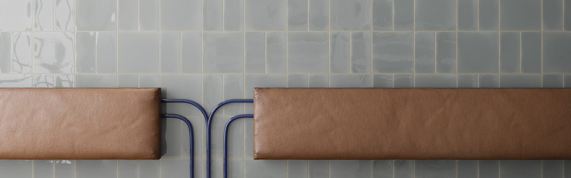 blue gray tile wall with tan leather