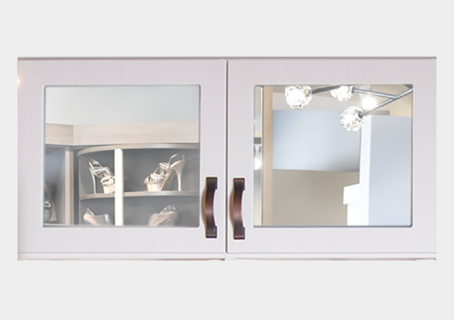 cabinet doors with mirrors and brass handles