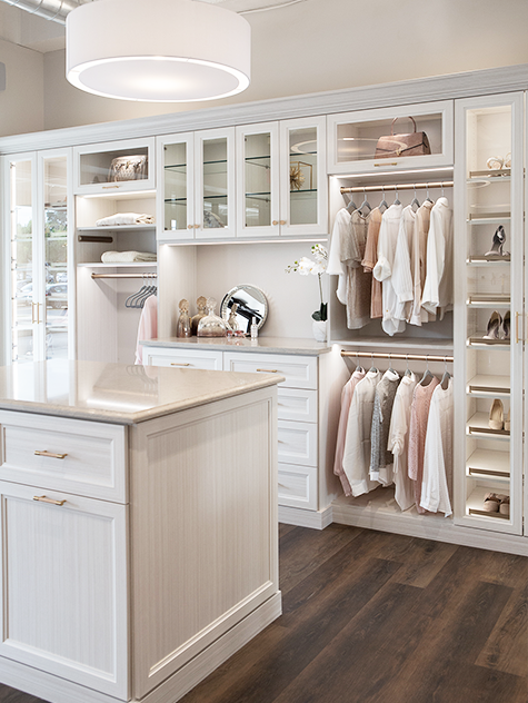 custom walk in closet organized