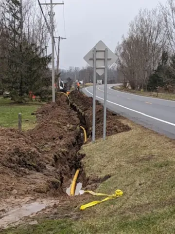Gas crew installing 2,000 ft. of 4" gas line in Churchville, NY.