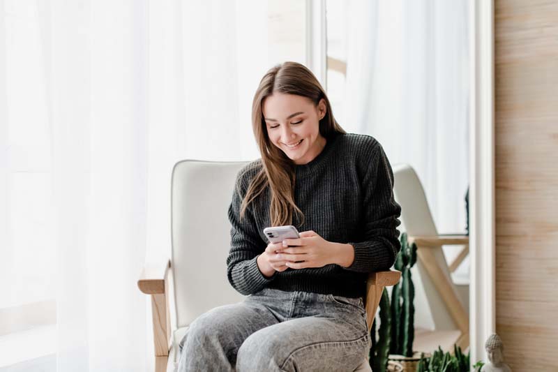 Girl surfing on her phone