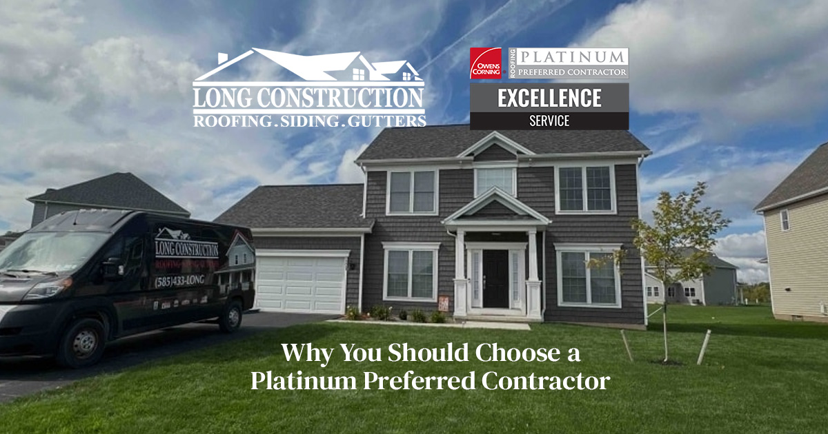 home with gray siding and long construction van in the driveway "why you should choose a platinum preferred contractor"