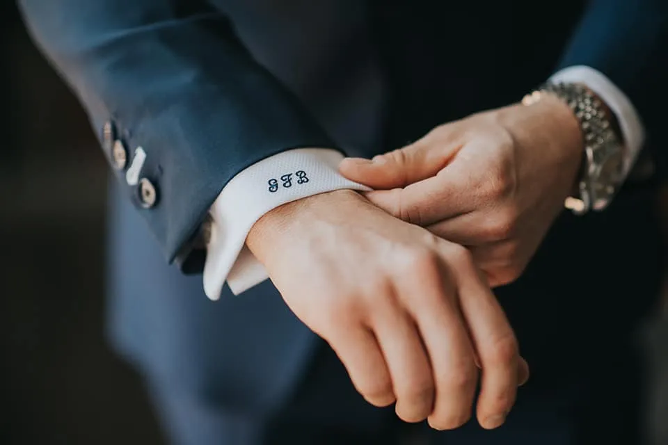 Groom in custom Adrian Jules suit