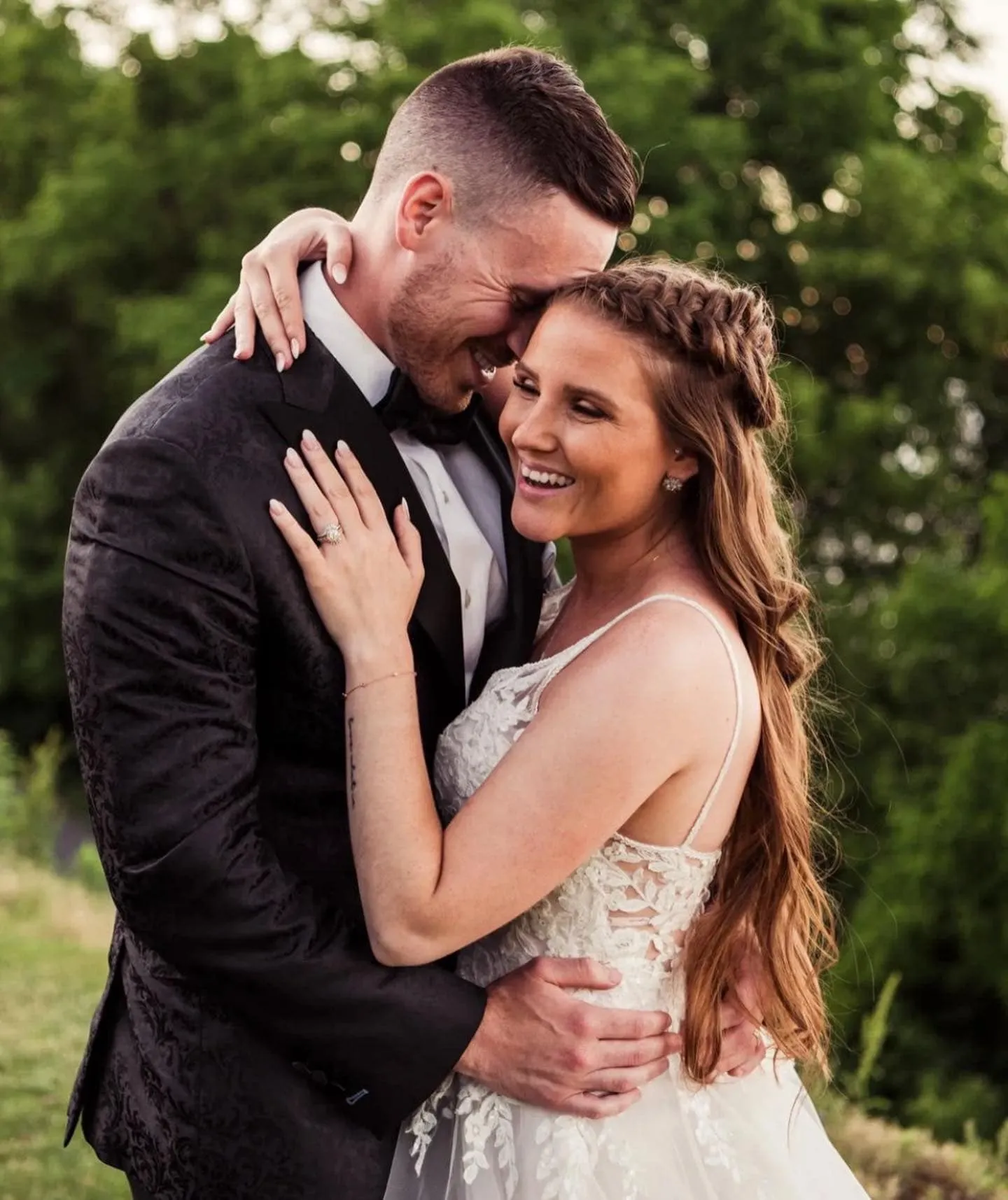 Groom in perfectly fitted custom wedding suit demonstrating distinctive elegance