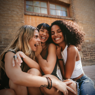 Two women recording a podcast