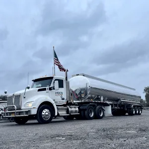 A white tanker truck