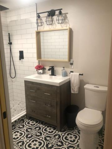 updated sink vanity and toilet bathroom renovation