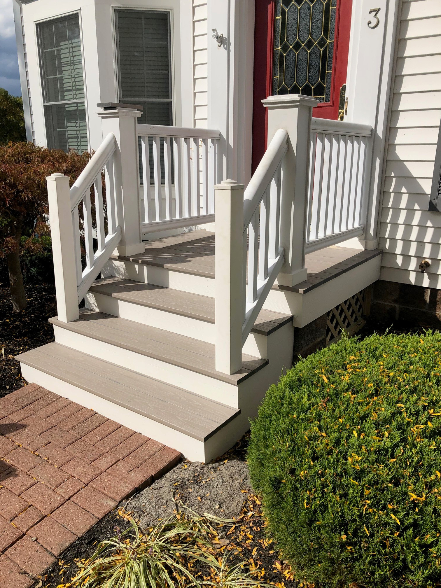 white and gray front steps