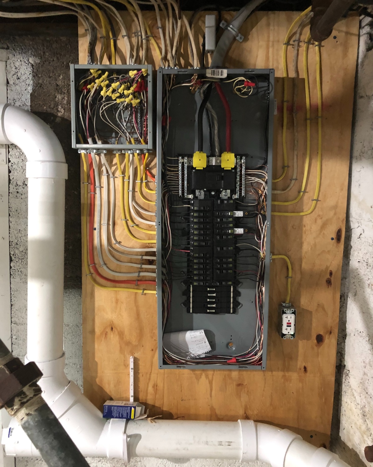 opened electrical panel with wires