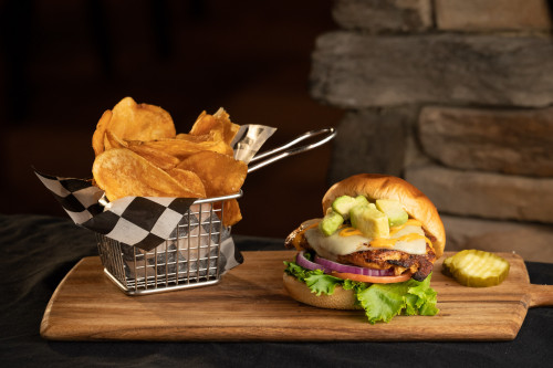 burger with a basket of hand cut fries