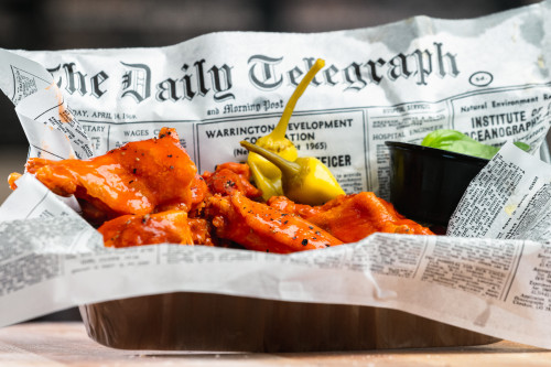 hot wings with banana peppers