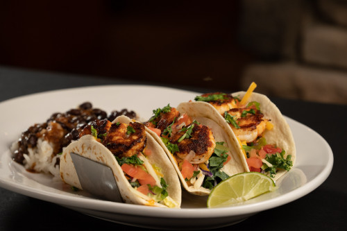 three blackened shrimp tacos