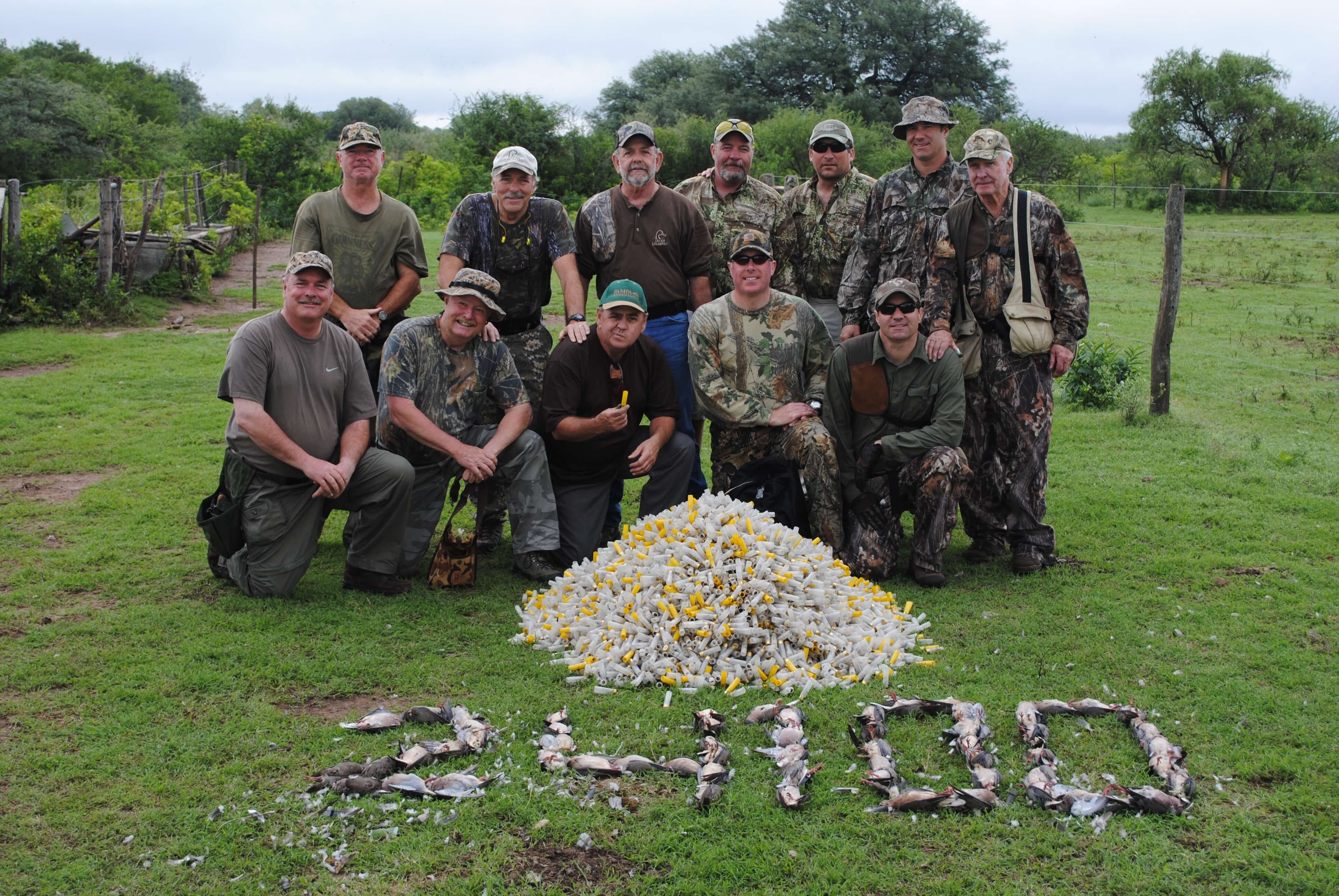 group of men with bird trophies