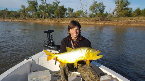 man posing with fish