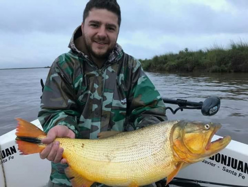 man with trophy fish