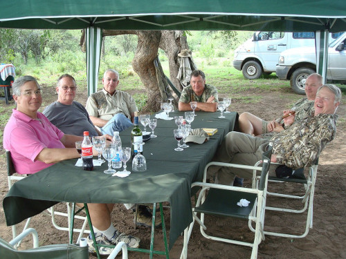group of hunters under a tent