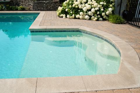 close up of steps into pool