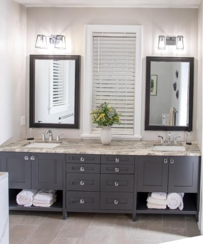 beautiful renovated bathroom with gray and tan colors