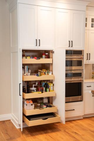 beautiful white cabinets with 5 slide out drawers