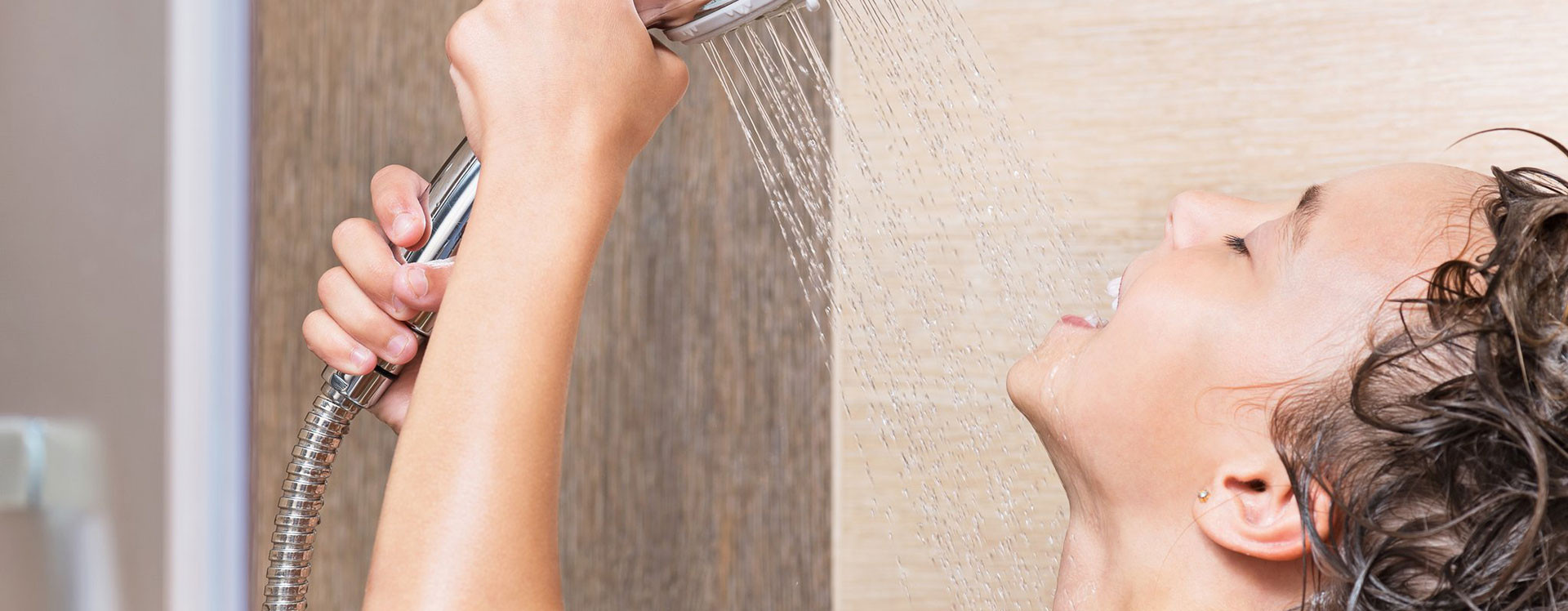 person showering with hot water