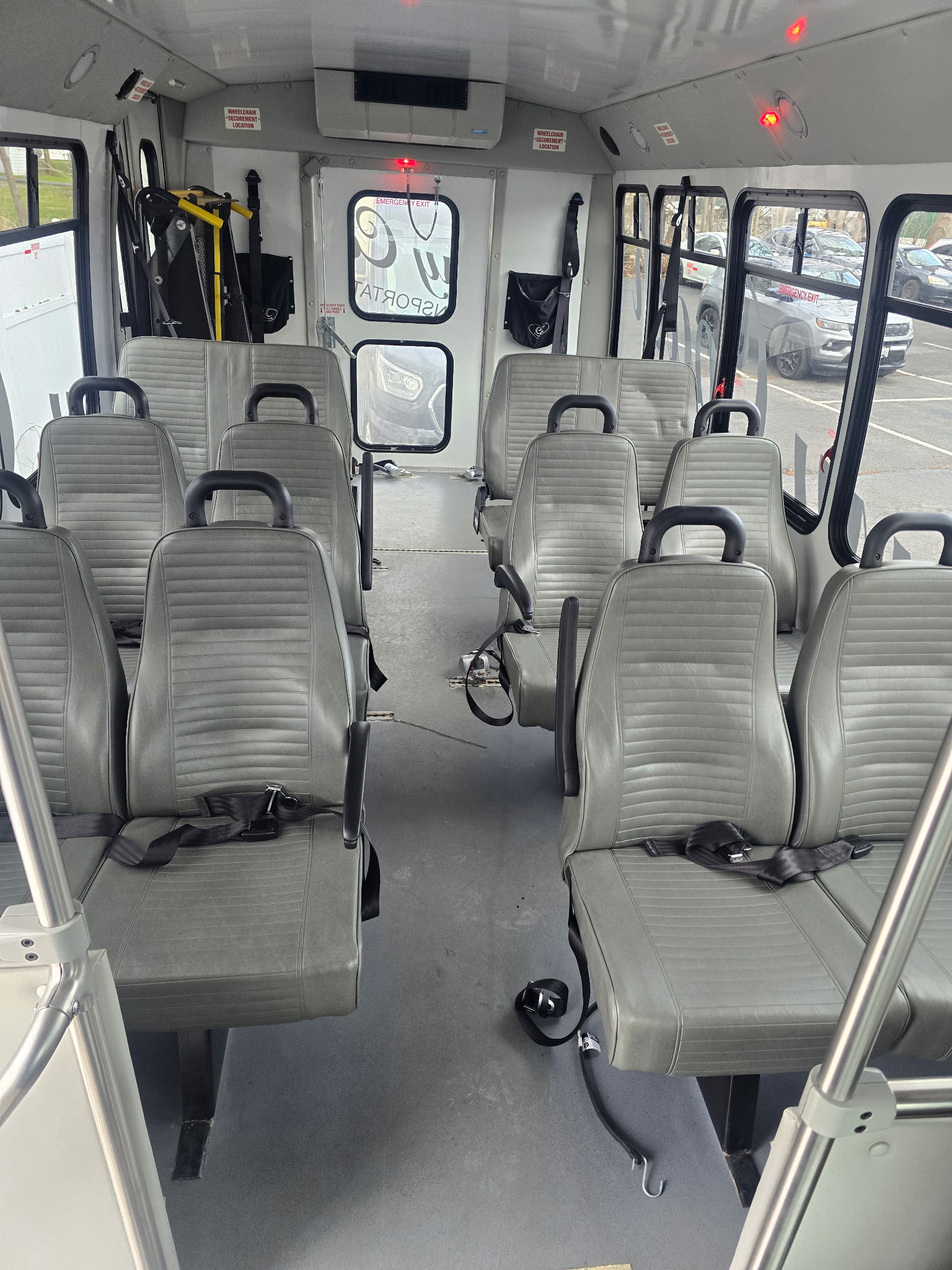 interior view of ada acessible passenger bus from classy coach