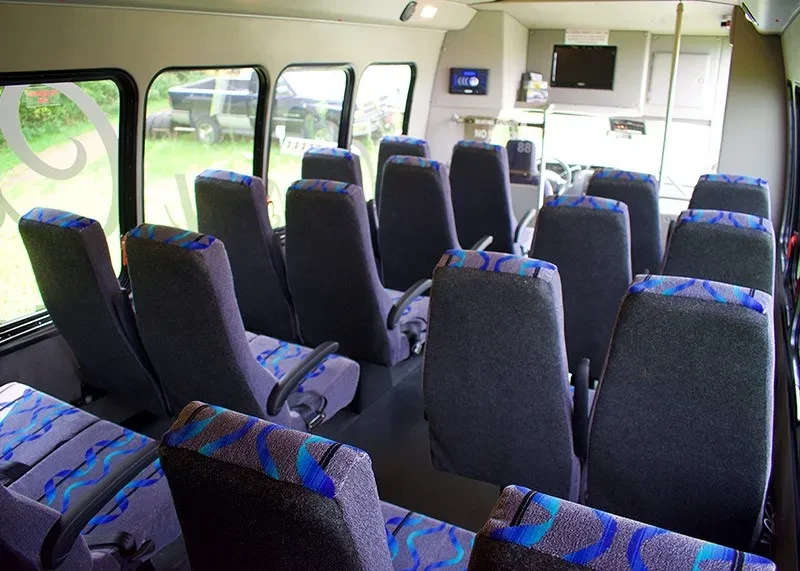interior of classy coach transportation bus from back rows
