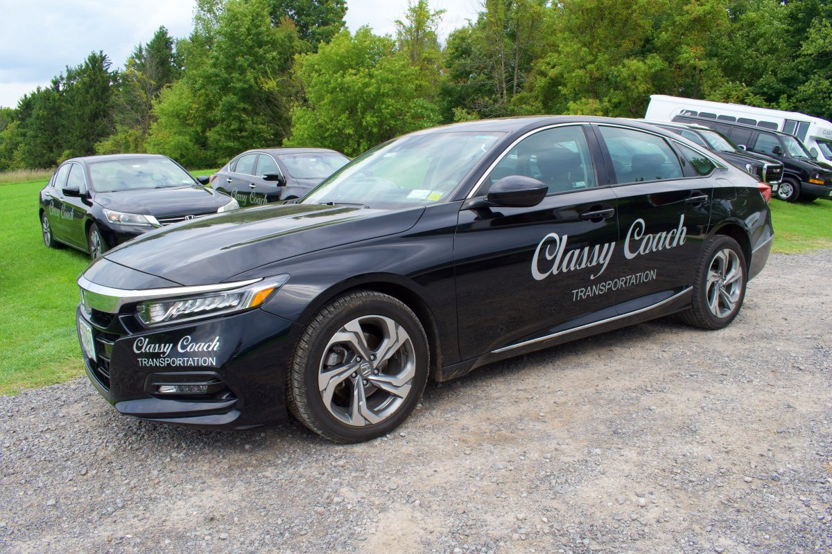 classy coach transportation sedan