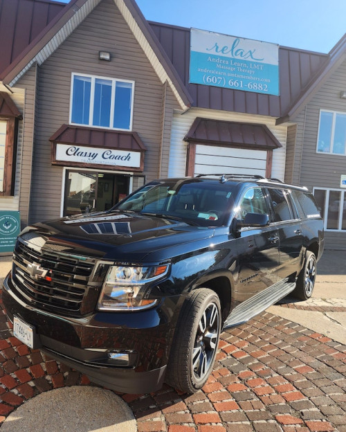 chevy black SUV from front side angle