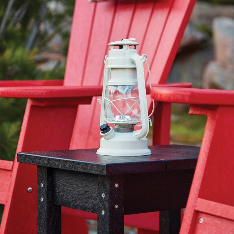 red adirondack chairs and fire lamp