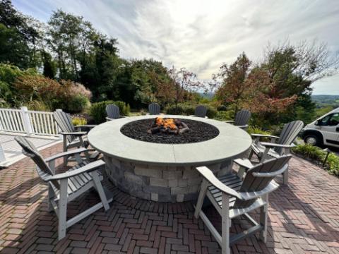 adirondack chairs around a firepit