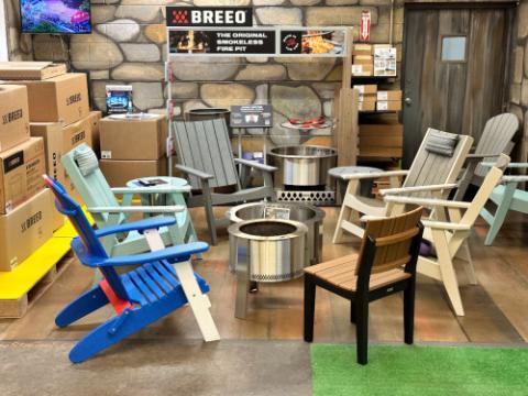 adirondack chairs around a fire pit