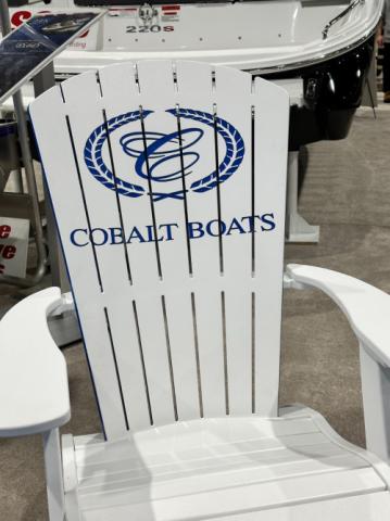 cobalt boats logo on an adirondack chair
