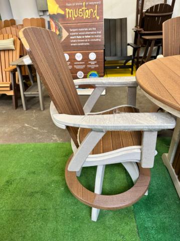 brown adirondack chair with white arms