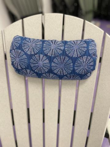 blue pillow on a white chair