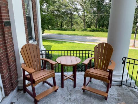 brown adirondack chairs and table